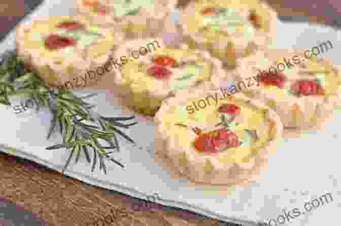 A Close Up Of A Miniature Quiche With A Golden Brown Crust And A Creamy Filling French Appetizers Marie Asselin