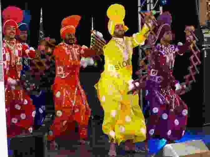 Performers Engaged In An Energetic Bhangra Dance Baisakhi Humberto De Souza